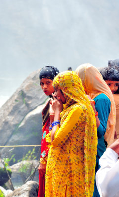 Tourists Under The Waterfalls