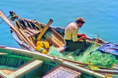 Fisherman Mending the Nets   