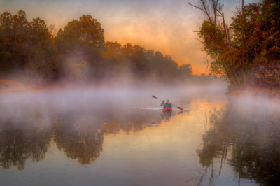paddling through mist