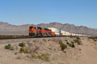 BNSF 6628 West (Z-MEMLAC7-02L) crossing US95 in the distance at Arrowhead Jct. (2/5/15)