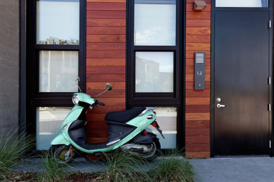 Moped in front of locked door