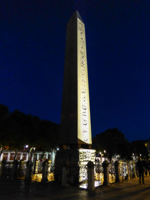 Egyptian obelisk at night