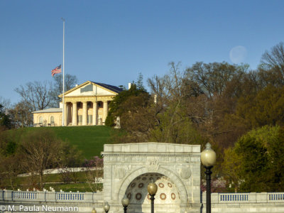 Full moon setting to right of Lee house at Arlington National Cemetery