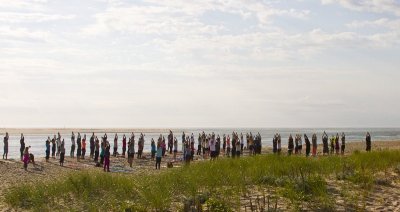 3.  A yoga gathering early on the beach.