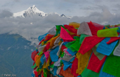 Meili Mountain with Tibetan pray flags in foreground