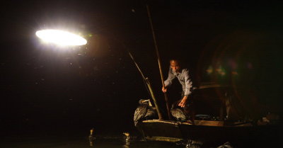 Yangshuo: Cormorant fishing using illuminated lamp