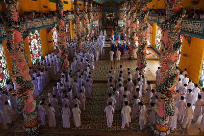 Inside Cao Dai temple, Cao Daism followers