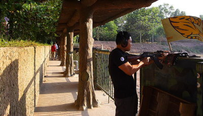 Me trying out the AK-47 (don't worry - no animals were harmed during the taking of  this picture!)