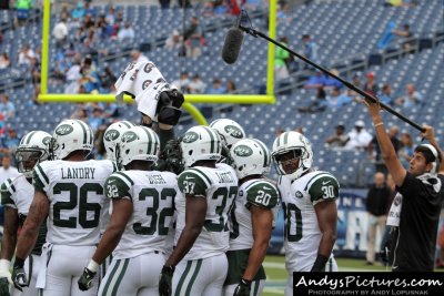 NY Jets defensive backs huddle