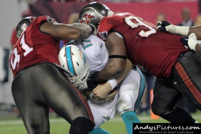 Tampa Bay Buccaneers' DaQuan Bowers & Gerald McCoy share a sack