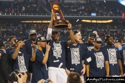 UCONN Huskies with the NCAA Championship trophy