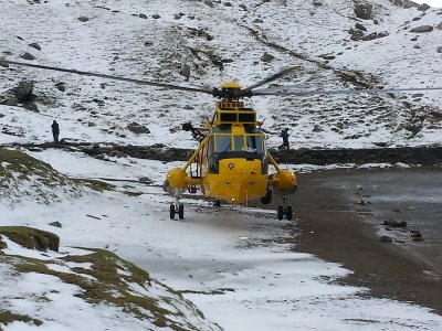 Photos of an actual rescue, man fell 30ft off snow covered edge