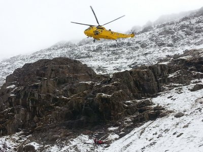 Photos of an actual rescue, man fell 30ft off snow covered edge