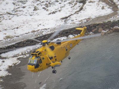 Photos of an actual rescue, man fell 30ft off snow covered edge