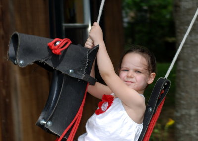 Addy on the horse swing