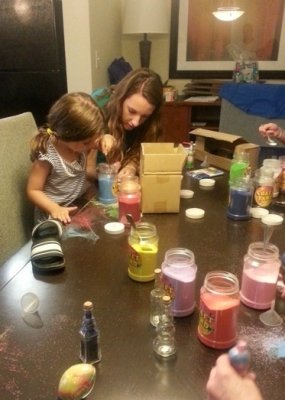 Rachel and Lucy doing sand art
