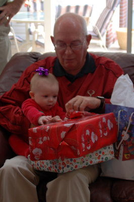 Coach and Laney open some presents
