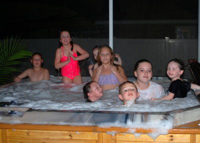 How many cousins can fit in the hot tub?