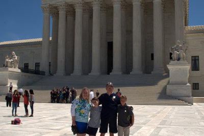 Grammy and Coach with boys in front of the Supreme Court building