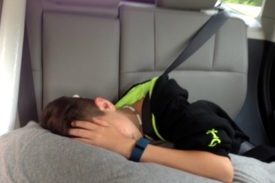 Carter sleeping in the car