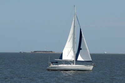Fort Sumter behind the sailboat