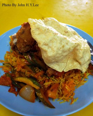 Nasi Brani With Fried Chicken And Pappadum.jpg