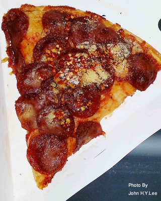 Pepperoni Pizza Quarter Slice.jpg