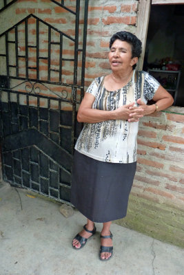 Maria Outside of her Home