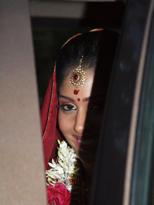 The bride awaits in the car