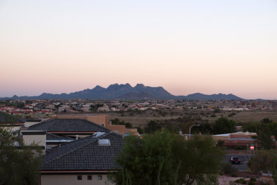 Mountain range in the distance at sunrise in Las Cruces