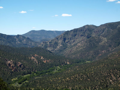 Valley with water flowing at the bottom