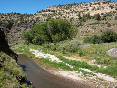 Gila river flows between canyon walls