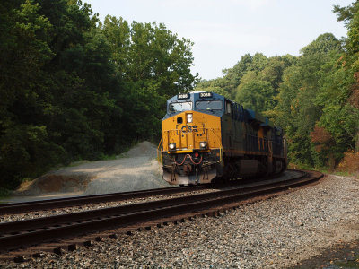 3088 passes by pulling freight