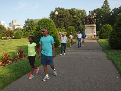 Marching past statue of George Washington