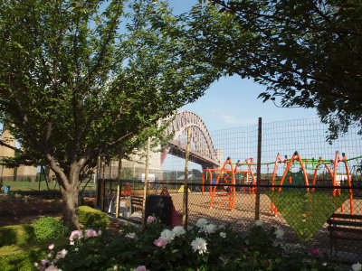 Juxtaposition of garden playground and bridge