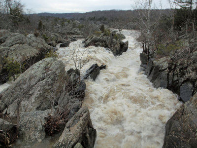 Water rushes downstream through the channel