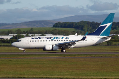 Westjet Boeing 737-7CT lands at Glasgow