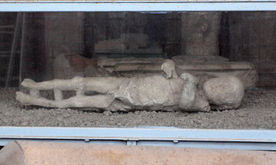 A mummified boy caught in the moment of death