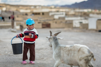 Young girl and goat - Tajikistan
