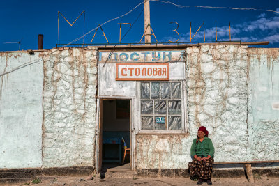 Woman outside shop - Kyrgyzstan