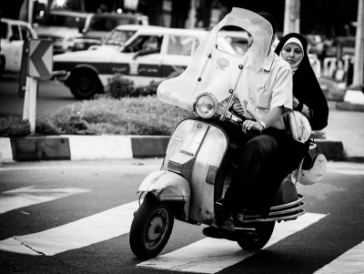 Man and woman on motorcycle - Tehran