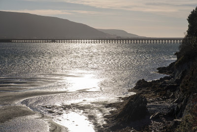 Barmouth Viaduct backlit by winter sun