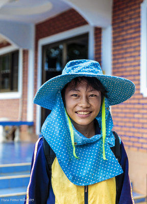 Young Hmong Lady Outside Her New House (6198)
