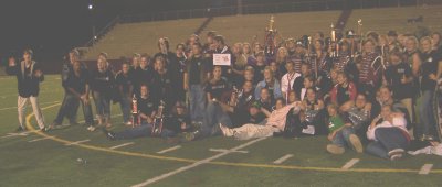 band group shot w trophies pville (1).jpg