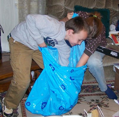 fighting to get into the big gift.jpg
