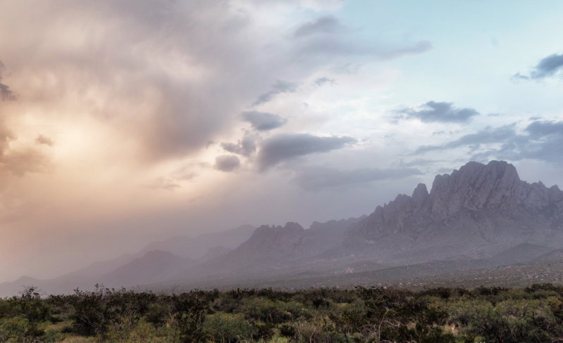Strange day - winds blowing dust, creating unusual clouds and light, in advance of rain storms scattered all over the region