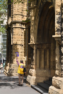 Tour guide looking for his flock.