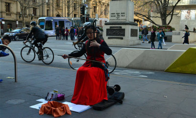 Listening to the soothing sounds of the Erhu on Swanston Street