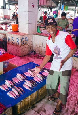 Fish seller with smile.jpg