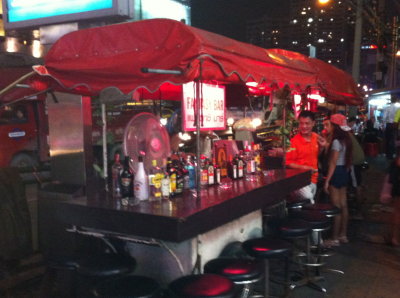 Makeshift bar by the entrance to Soi Cowboy